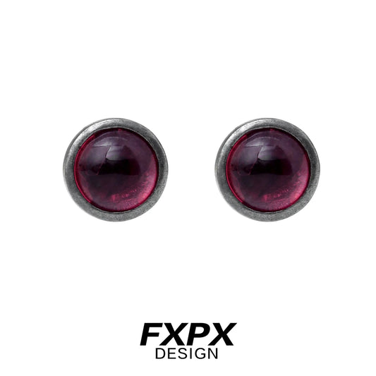 FXPX punk crystal stud earrings in deep purple with a sleek metallic setting