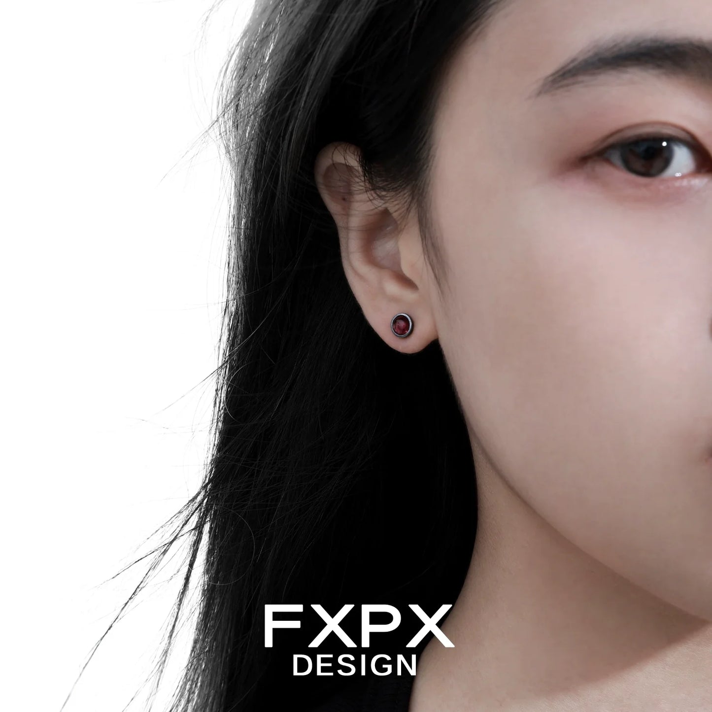 Elegant FXPX punk crystal stud earrings displayed on a model's ear for a trendy look