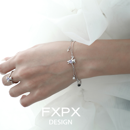 Stylish purple bear charm bracelet from FXPX featuring delicate charms and a silver chain