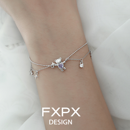 Stylish FXPX purple bear charm bracelet with sparkling charms perfect for casual wear