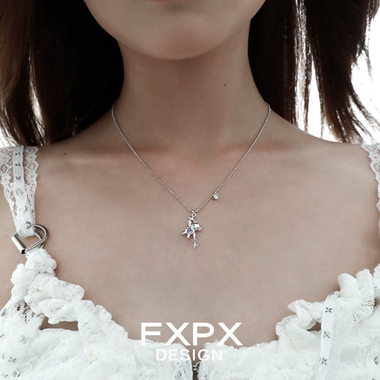 Stylish FXPX purple zircon bear necklace on a model, showcasing its elegant design and sparkle