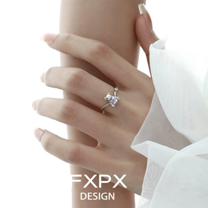 Elegant FXPX purple zircon bear ring on a model's hand showcasing its charming design
