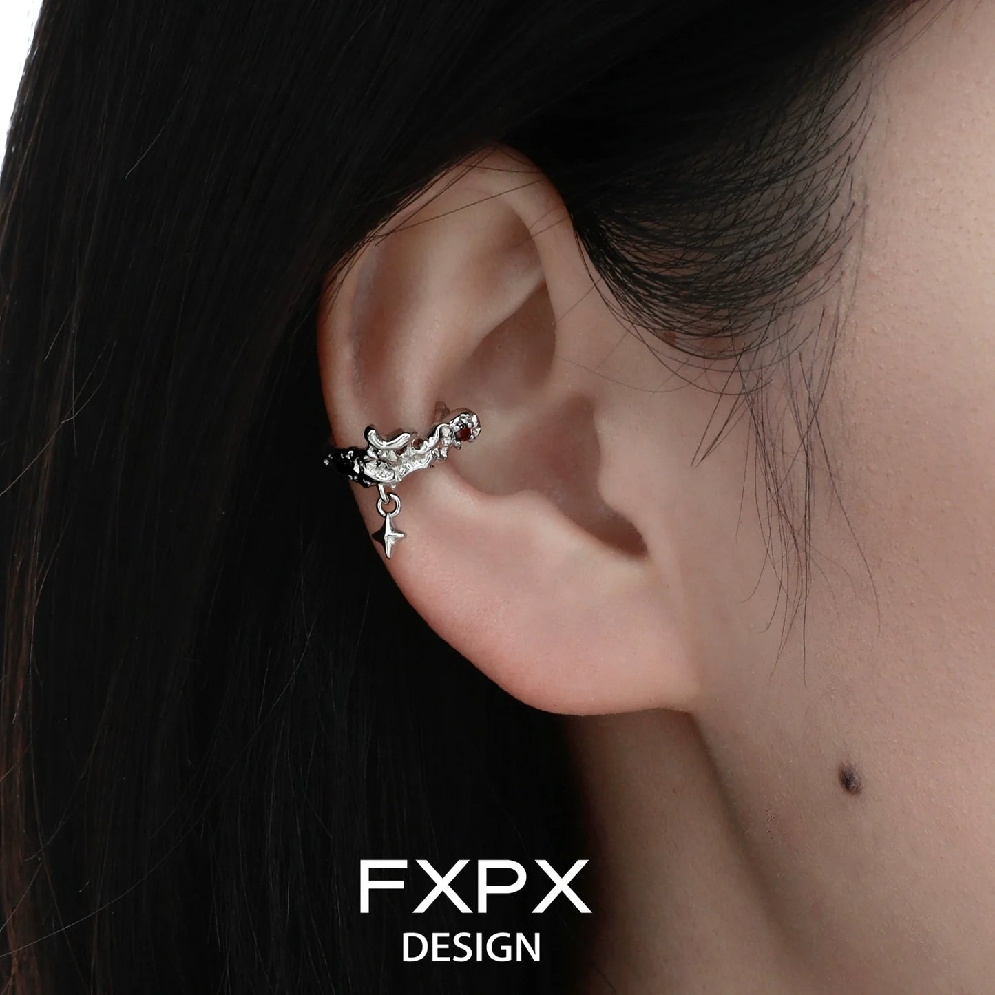 Stylish FXPX ear clips featuring red zircon stones for a unique and elegant look