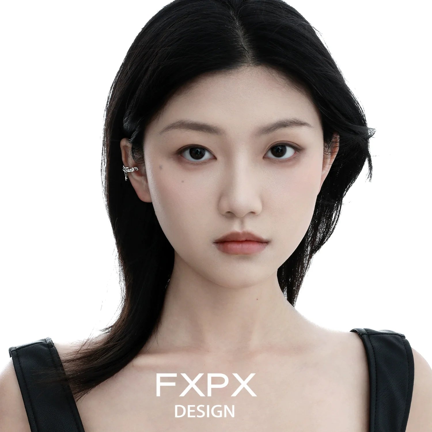 Stylish FXPX red zircon ear clips showcased on a model's ear for a trendy look