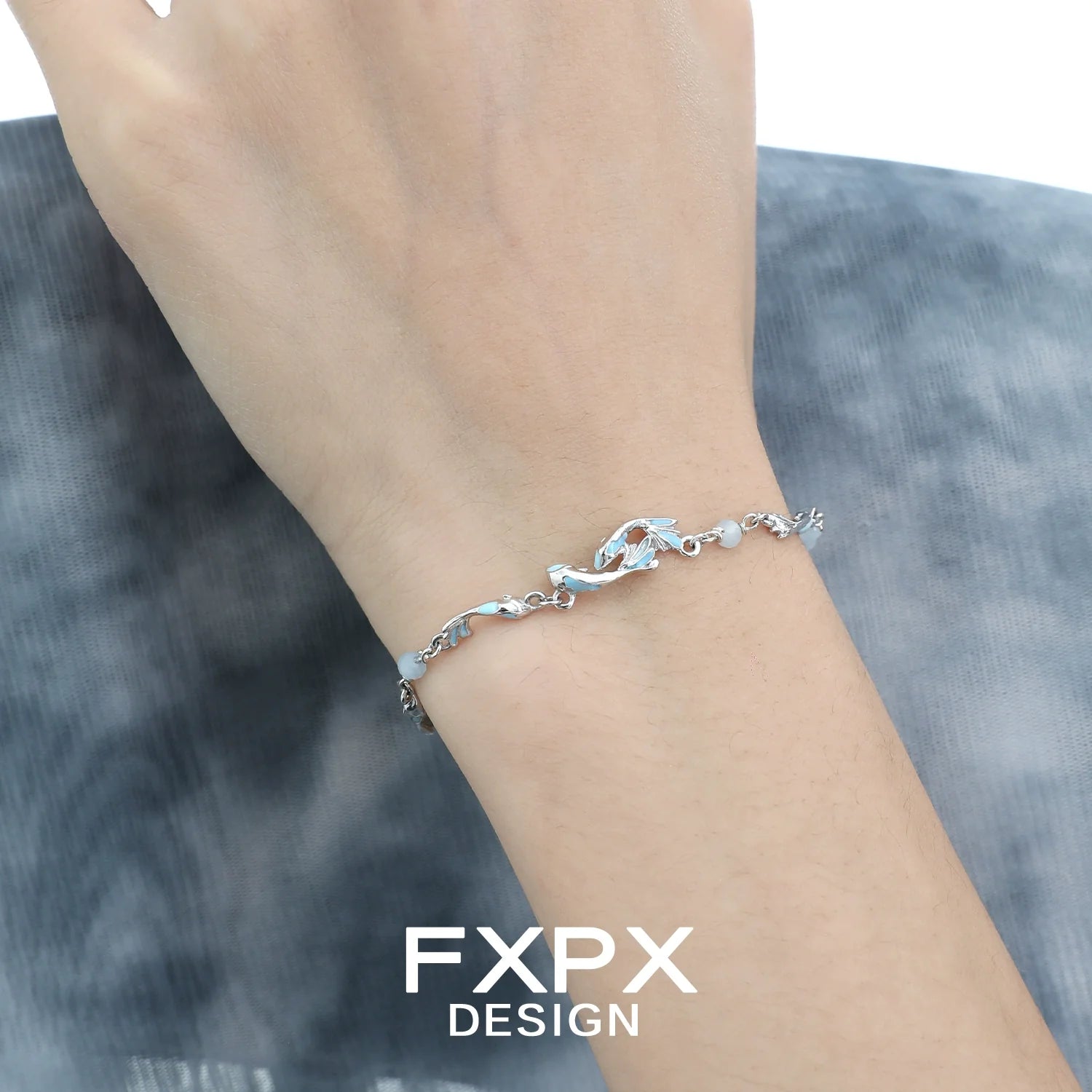 FXPX sea bluefish beaded bracelet elegantly displayed on a wrist against a stylish background