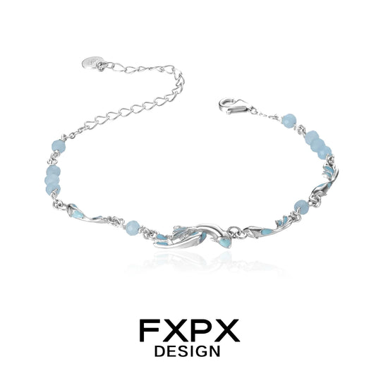 FXPX sea bluefish beaded bracelet with silver accents and smooth blue beads