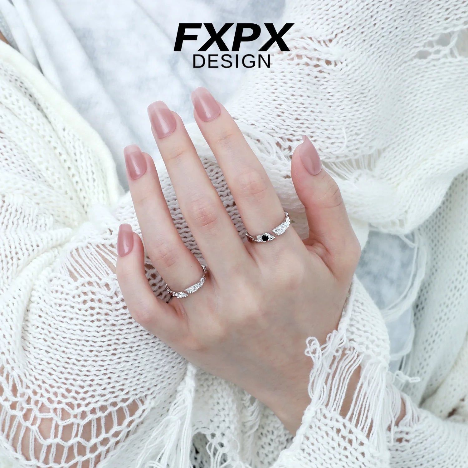 Elegant FXPX secret bond couple rings featuring unique designs, perfect for celebrating love and connection
