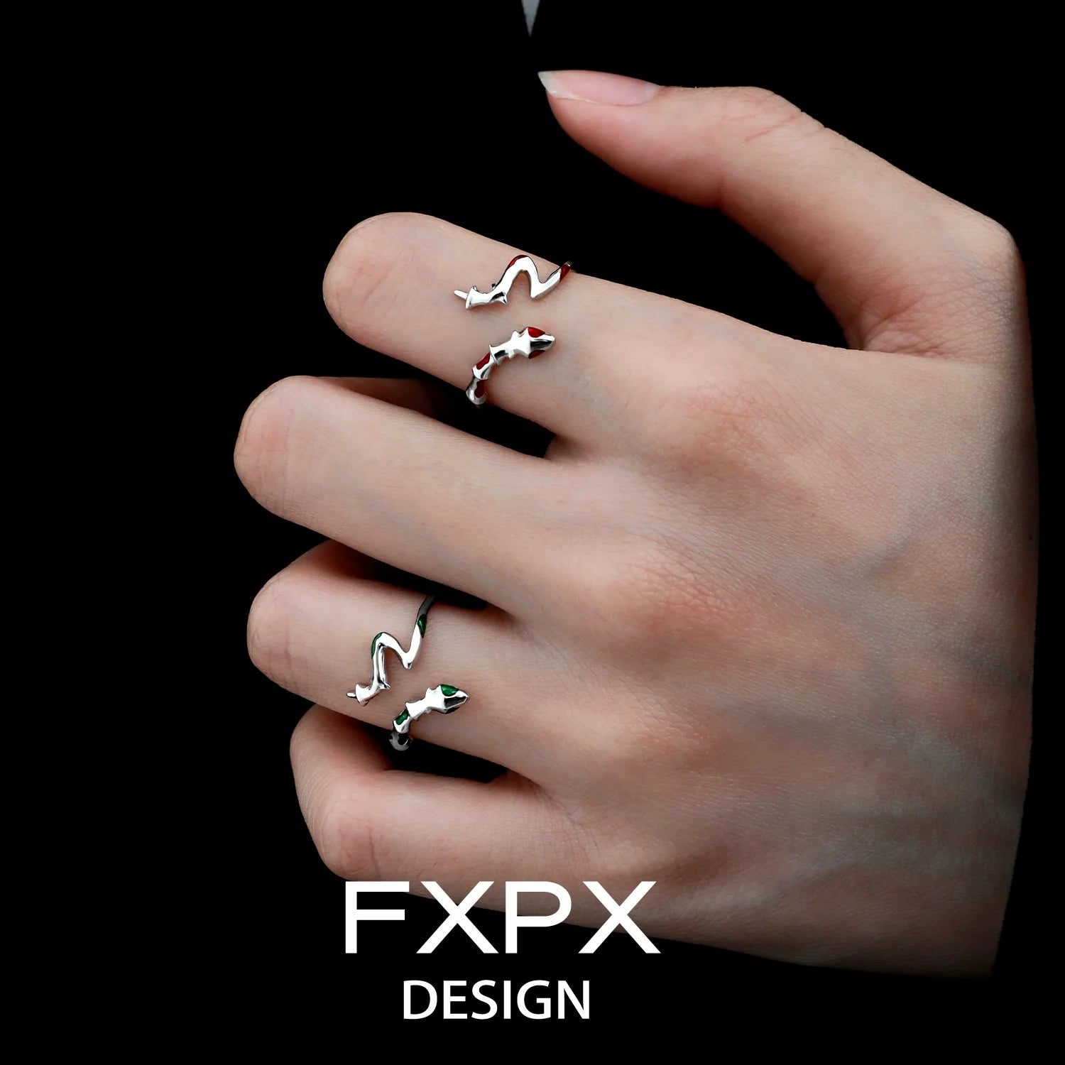 Stylish FXPX serpentine rings displayed on a hand, showcasing unique twisting designs
