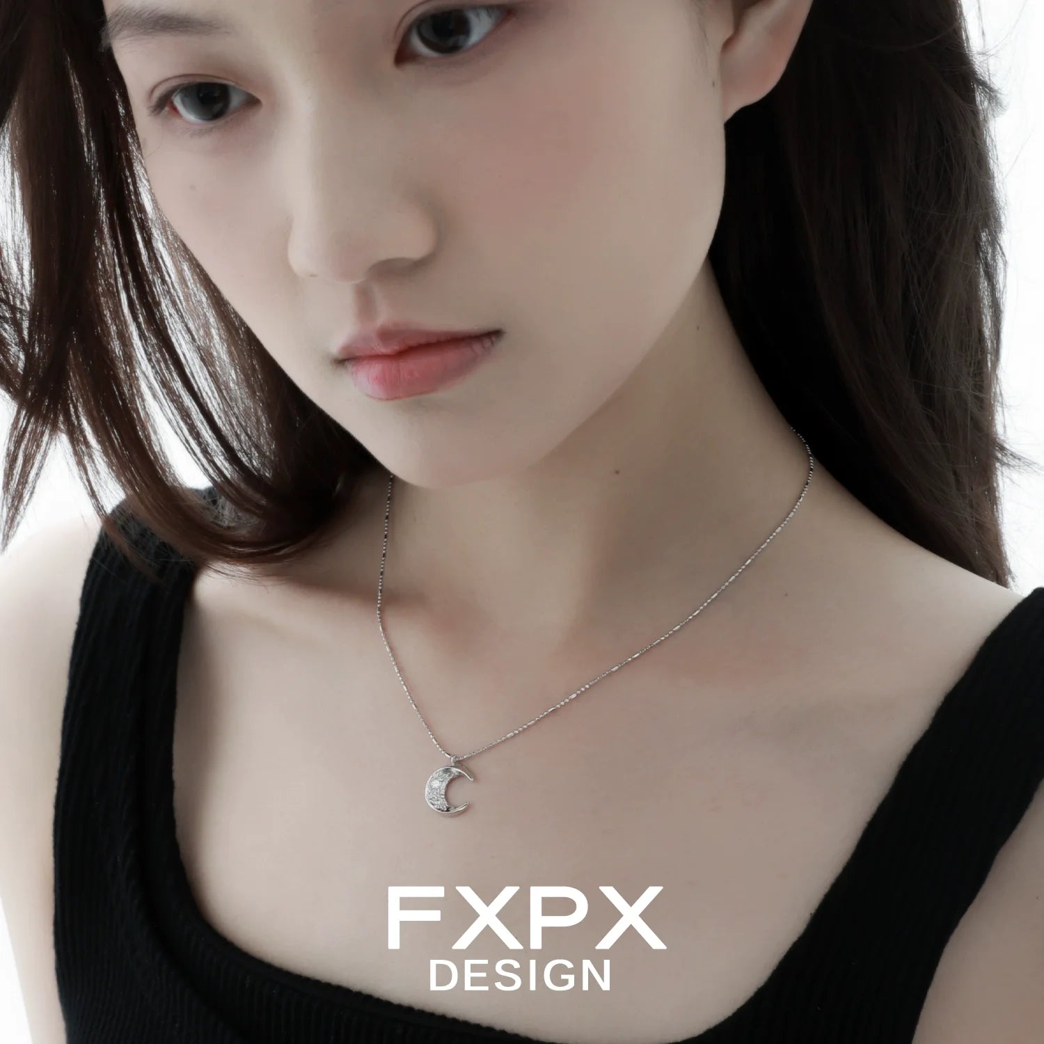 Model wearing FXPX shattered moonlight zircon necklace showcasing its elegant design and shine