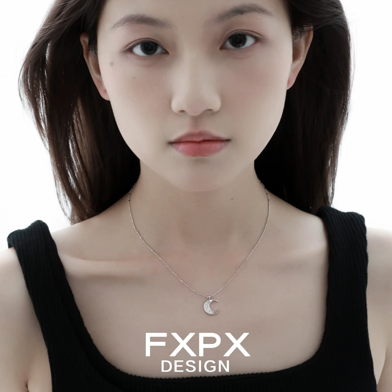 Shattered moonlight zircon necklace worn by a model, showcasing a delicate silver design