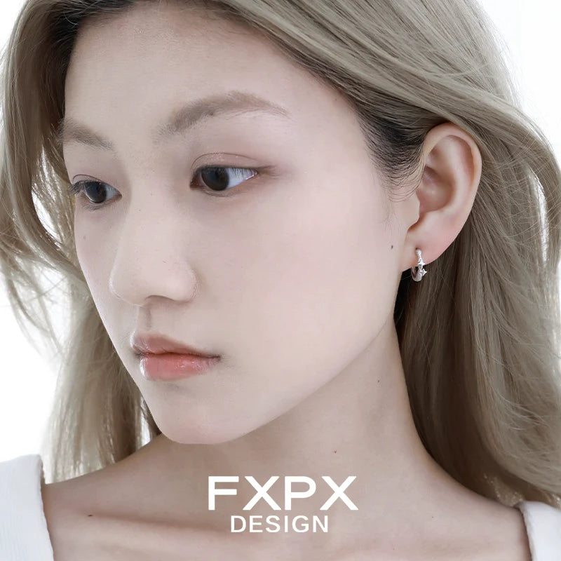 Elegant shattered star silver earrings showcased on model, perfect for any occasion