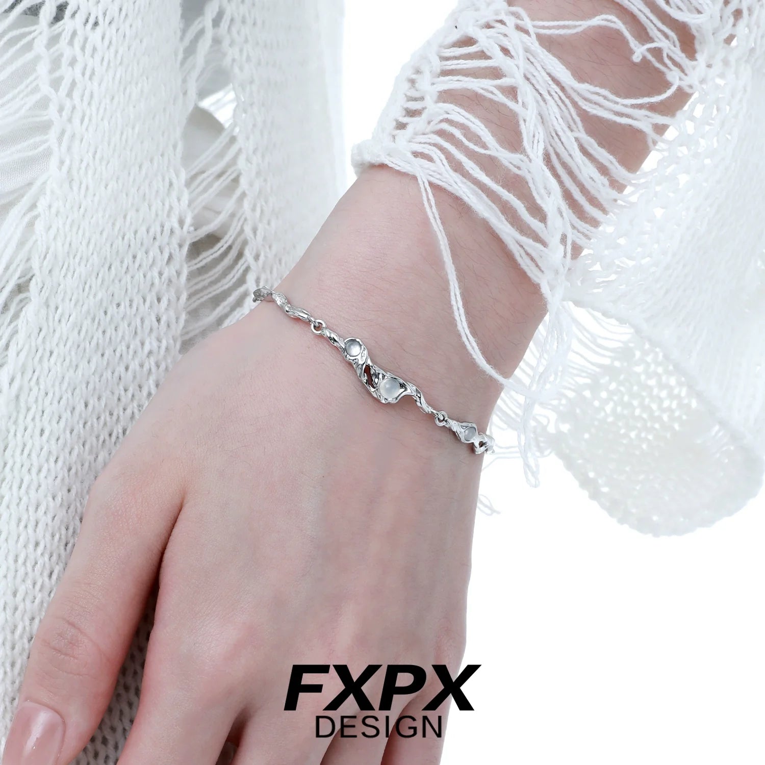 Elegant FXPX silver bracelet for women featuring intricate designs and a comfortable fit