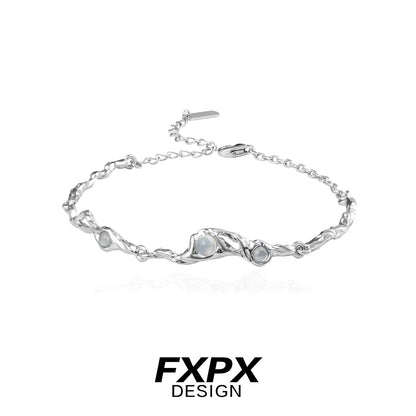 Elegant FXPX silver bracelet for women featuring a twisted design and decorative stones
