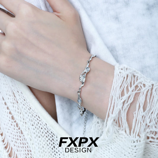 Stylish FXPX silver bracelet for women featuring a unique twisted design for elegant accessorizing