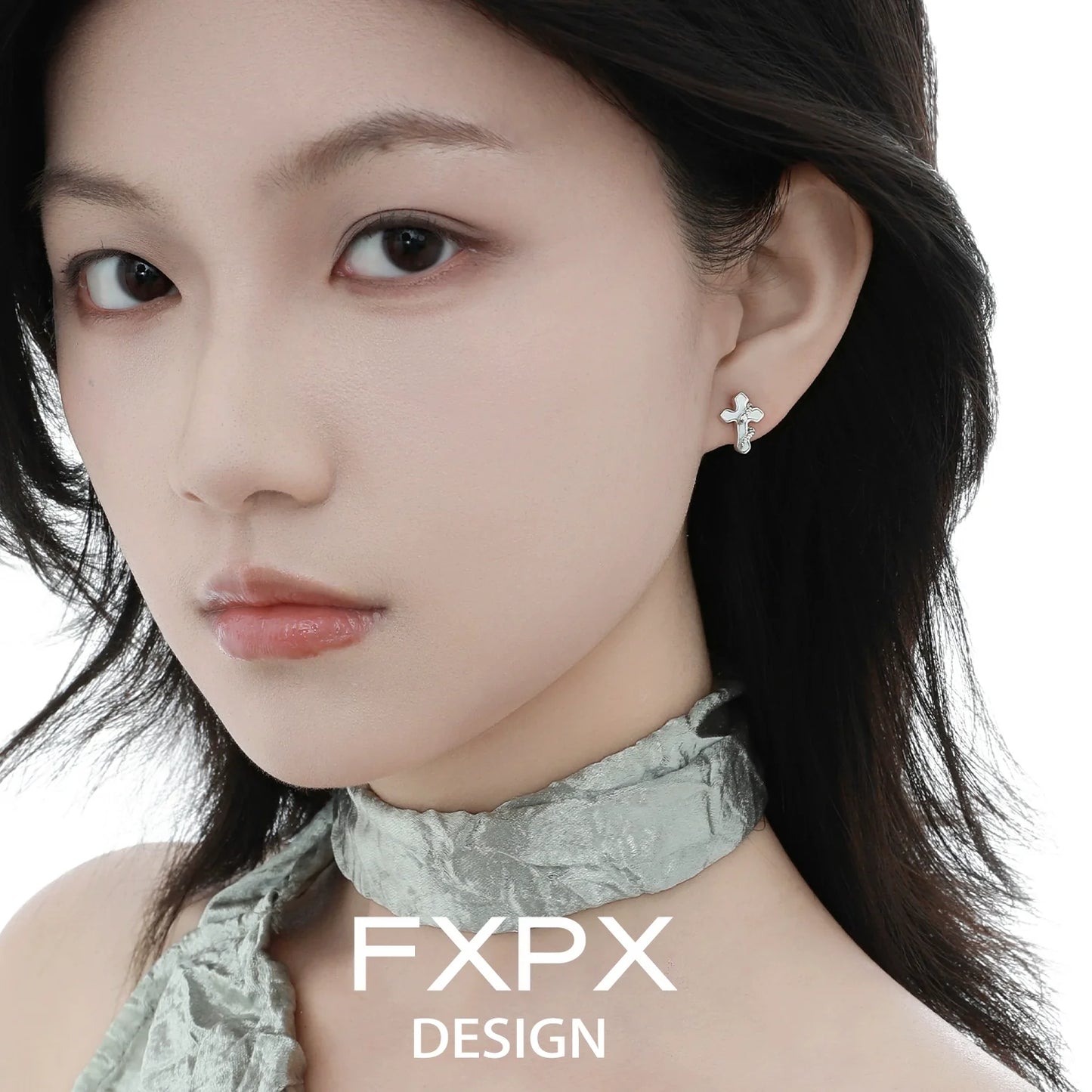 Elegant snake wrap cross earrings by FXPX, showcasing a unique and stylish design for any outfit