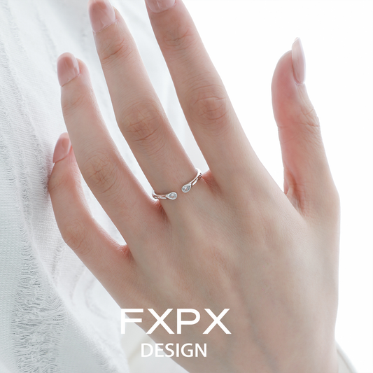 Elegant FXPX star gaze couple rings featuring a unique teardrop design for a romantic touch