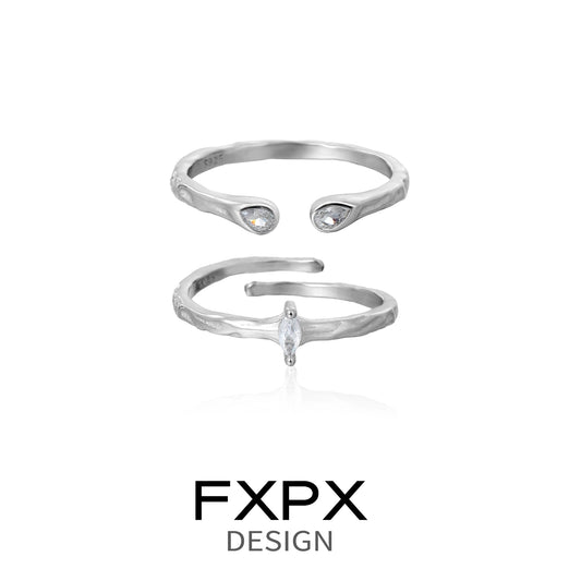 FXPX star gaze couple rings in silver with unique teardrop shapes and sparkling stones