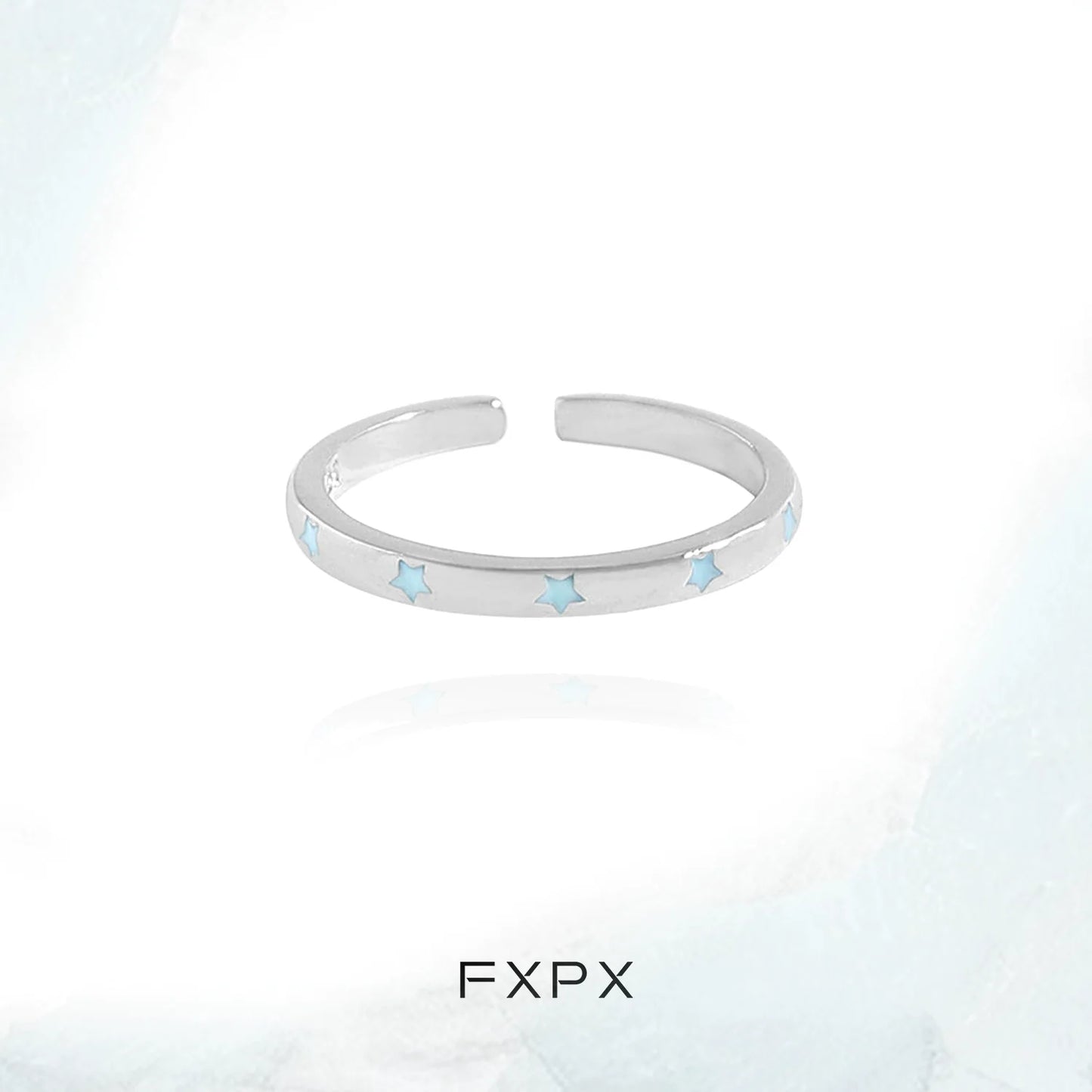 Elegant FXPX star ring for women with light blue star accents on a silver band
