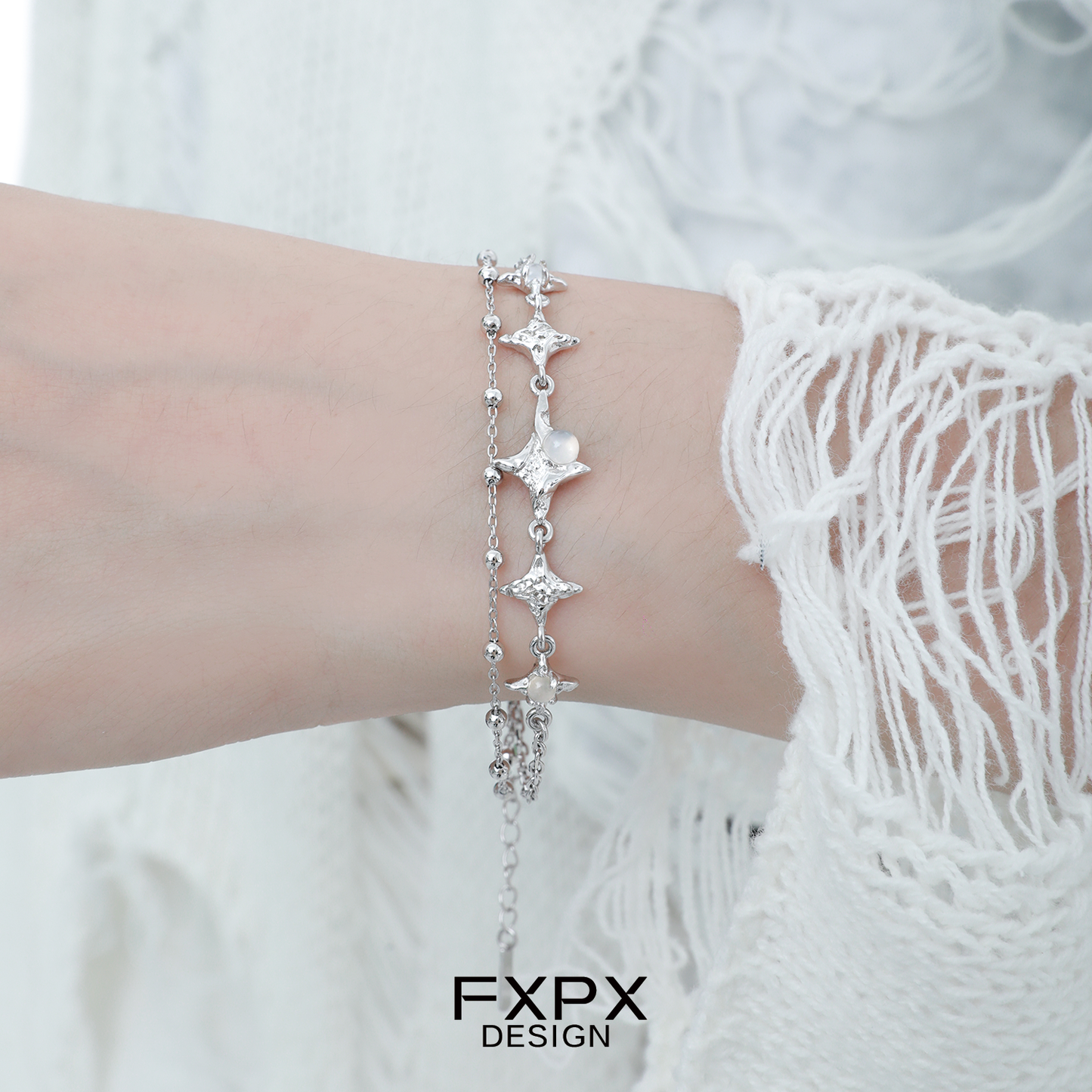 Dainty FXPX star silver bracelet with a charming star design, perfect for trendy accessorizing