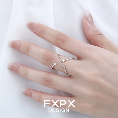 Delicate FXPX star silver ring on a hand, ideal for adding a touch of elegance to your jewelry collection