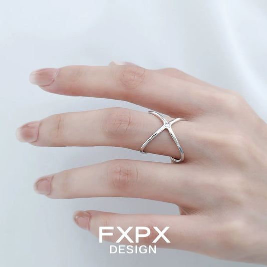 Elegant FXPX star silver ring showcased on a hand with a minimalist design