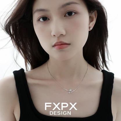 Elegant FXPX starfish necklace on a model, showcasing a delicate design and ocean-inspired style