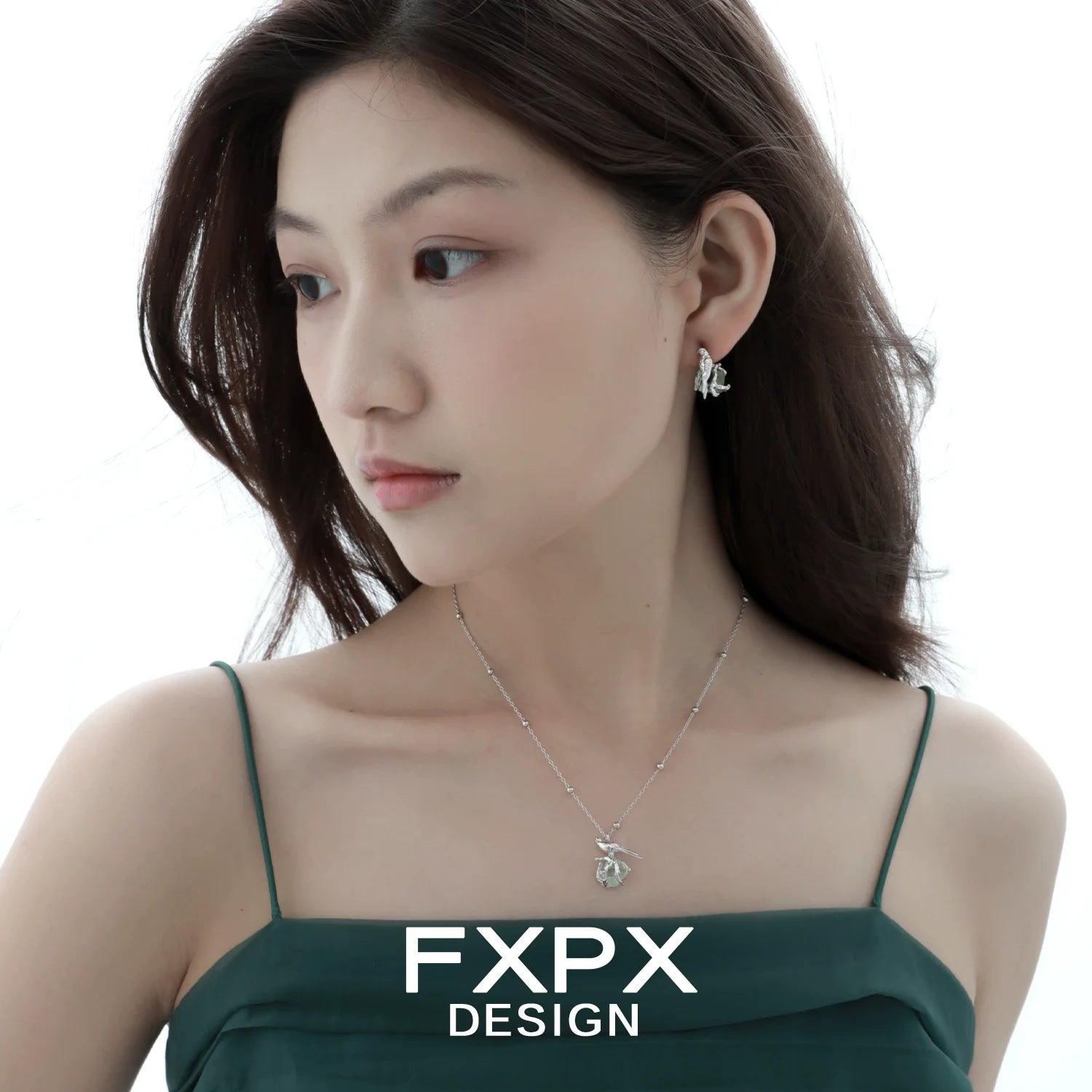 Swallow fluorite silver necklace showcased on model wearing elegant attire