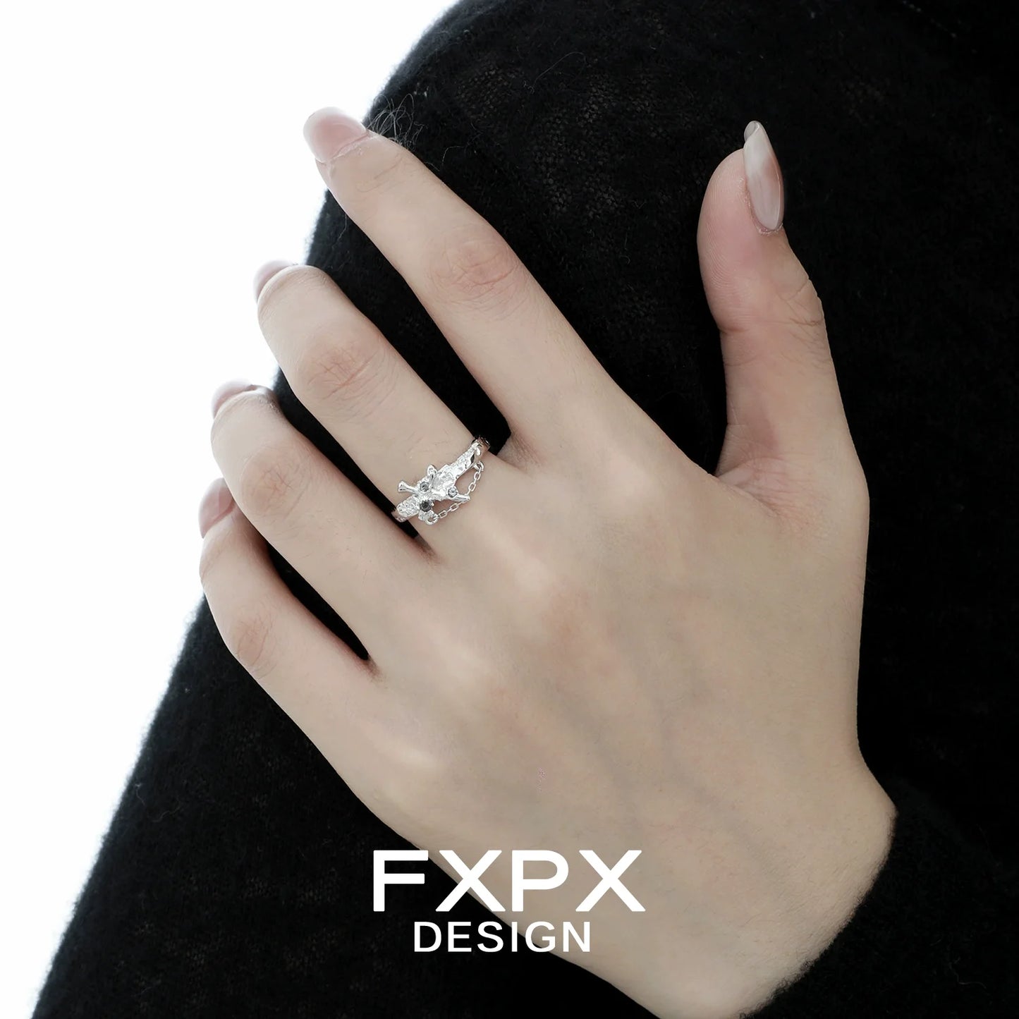 FXPX silver sword cross ring featuring intricate design and sparkling stones, elegant for everyday wear