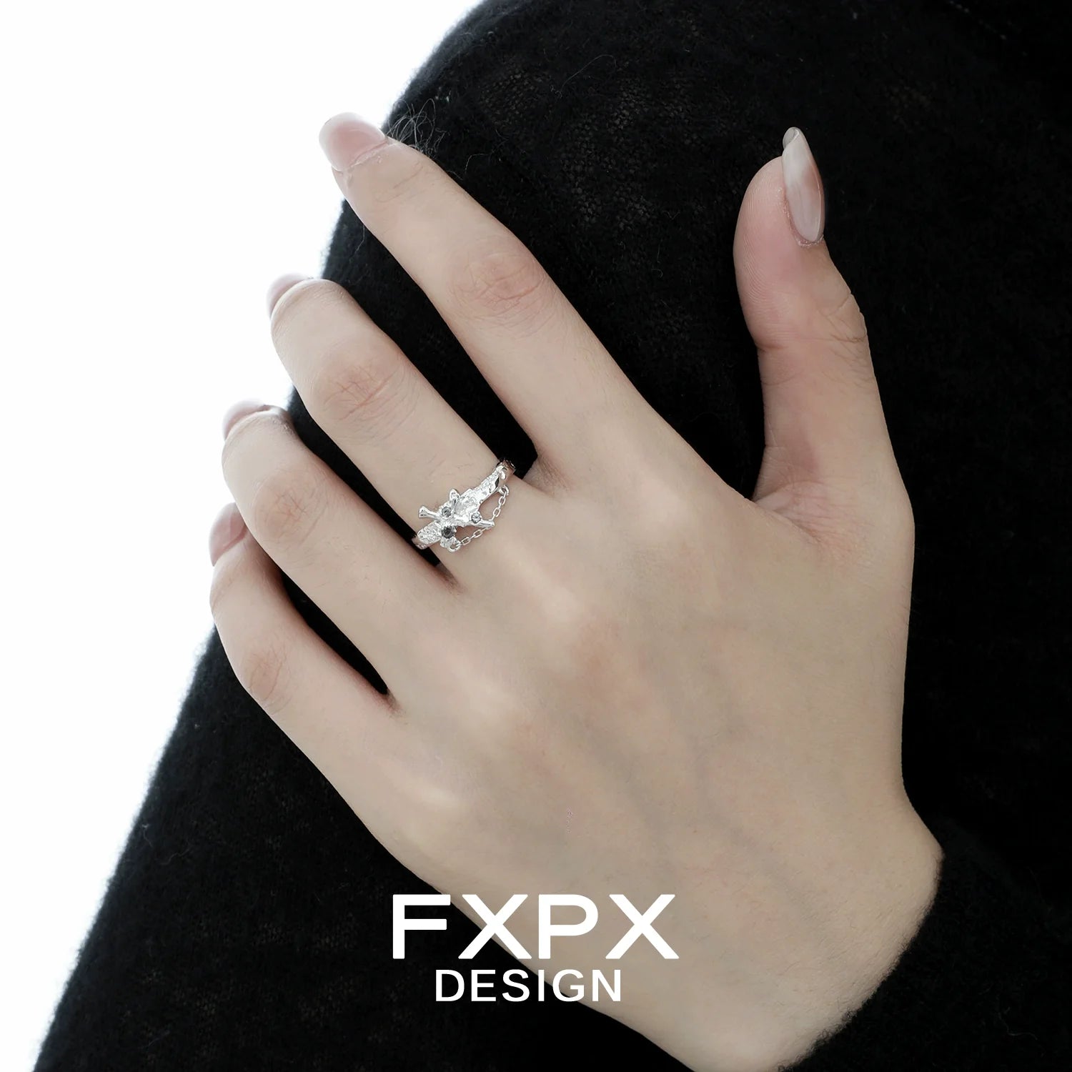 FXPX silver sword cross ring featuring intricate design and sparkling stones, elegant for everyday wear