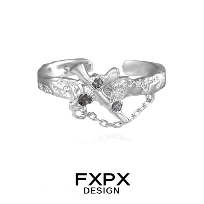 FXPX silver sword cross ring featuring intricate design and decorative stones