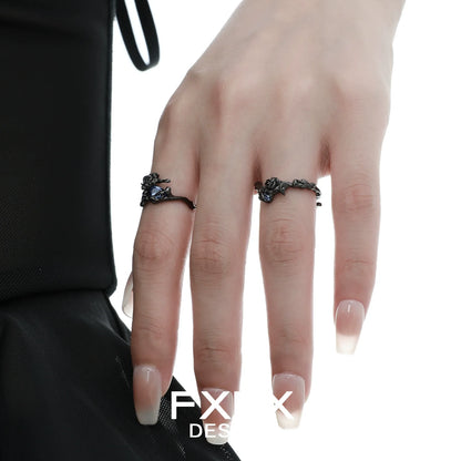 Elegant FXPX Tanzanian blue rose ring showcased on model's fingers for a stylish look