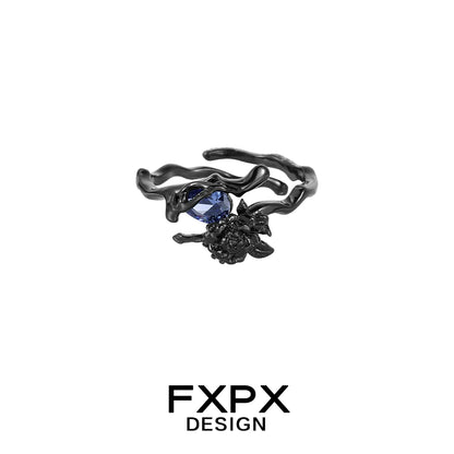 FXPX Tanzanian blue rose ring featuring an elegant design with a stunning blue gemstone