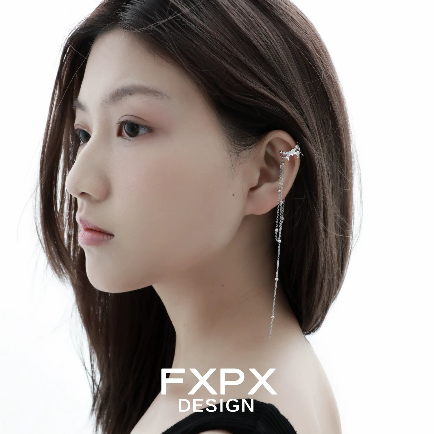 Stylish FXPX tassel ear cuff for women featured on a model showcasing its elegant design