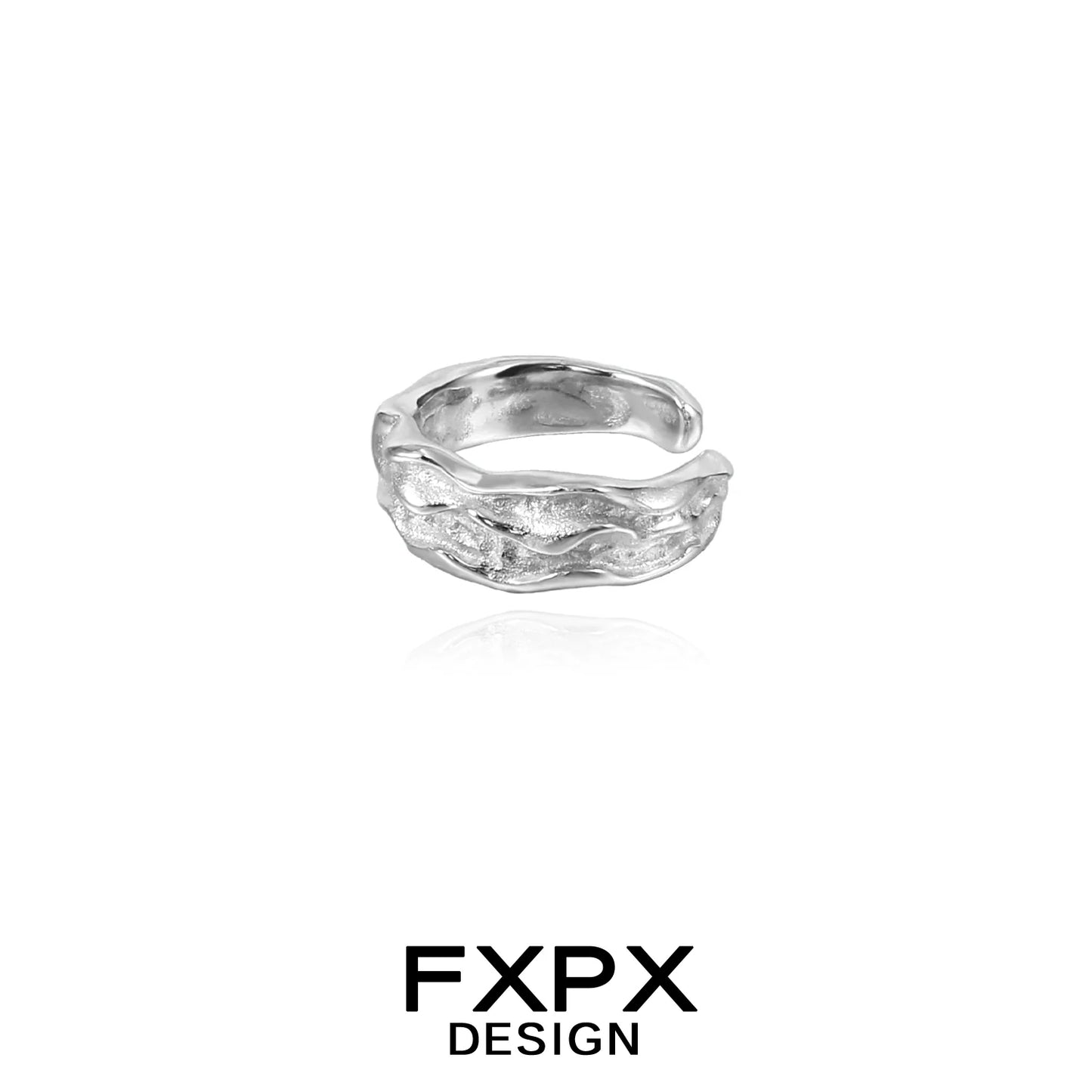 Textured silver ear cuff by FXPX with a unique wave design for stylish ear accessories