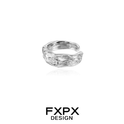Textured silver ear cuff by FXPX with a unique wavy design for a stylish look