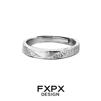 FXPX unique couple rings in silver with a textured finish for a distinctive look