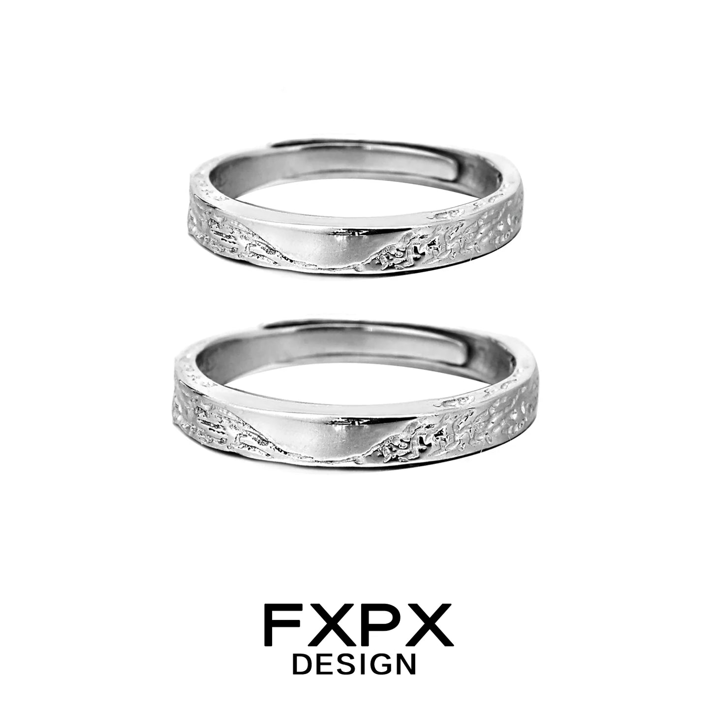 Unique couple rings by FXPX with intricate textured designs in a polished silver finish