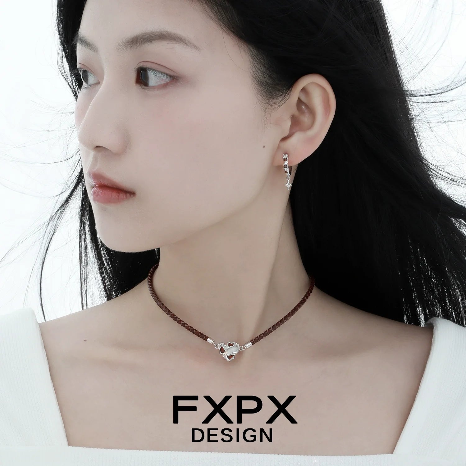 Stylish model wearing vintage checker earrings with a minimalist design and elegant hairstyle