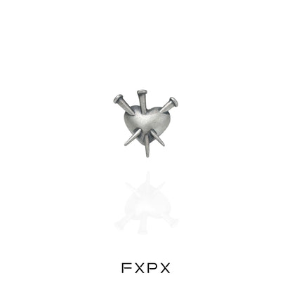 Vintage punk silver earrings featuring a heart design with spikes for a bold accessory