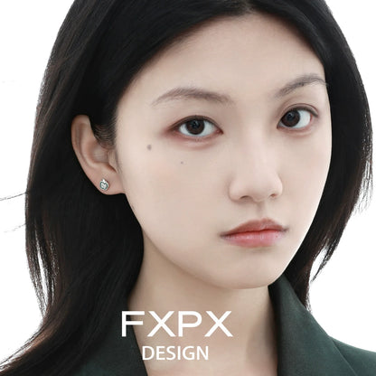FXPX Y2K apple earrings in silver design worn by a model with dark hair
