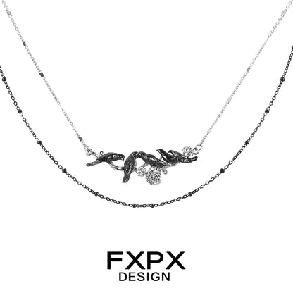 FXPX Y2K crow pendant necklace featuring a stylish layered design with silver and black chains