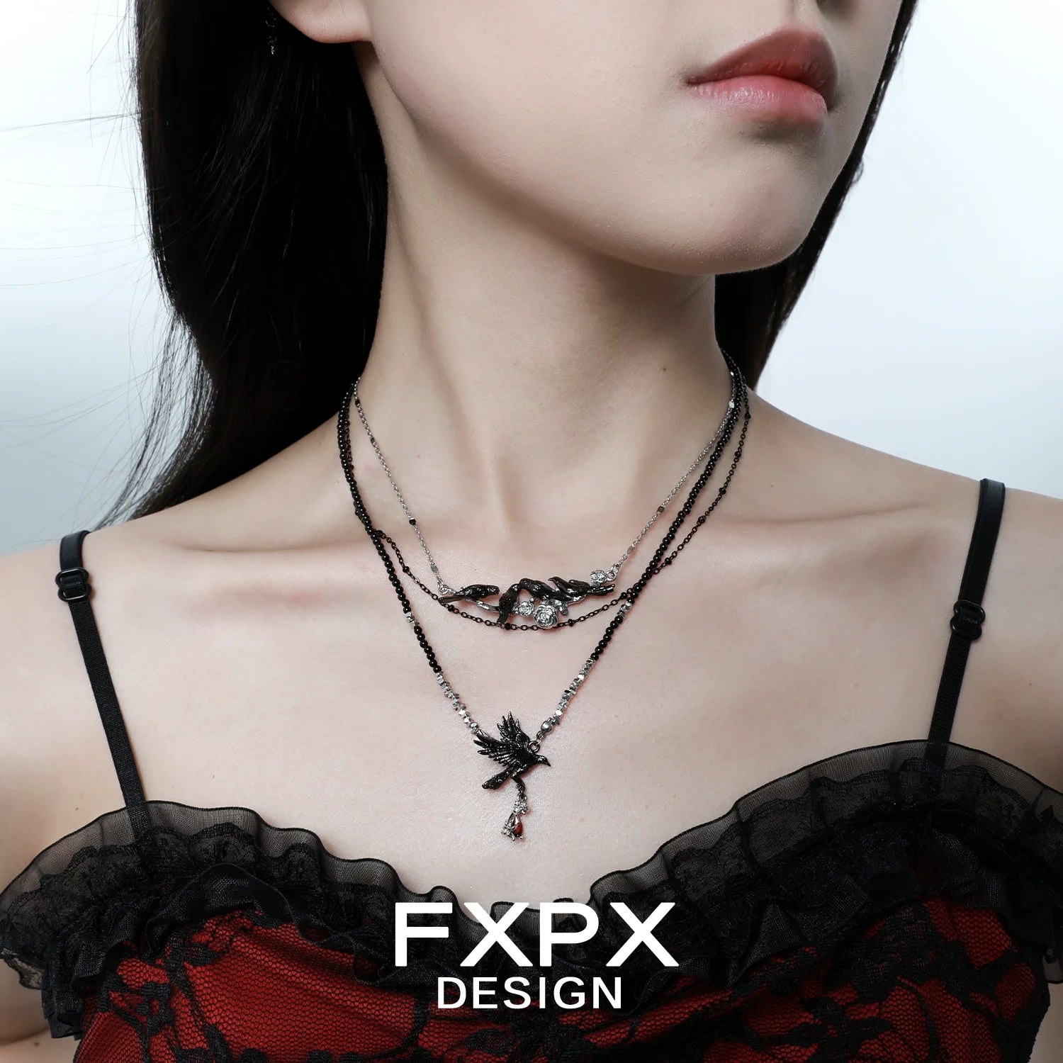 Y2K crow pendant necklace with layered chains for a trendy and edgy style