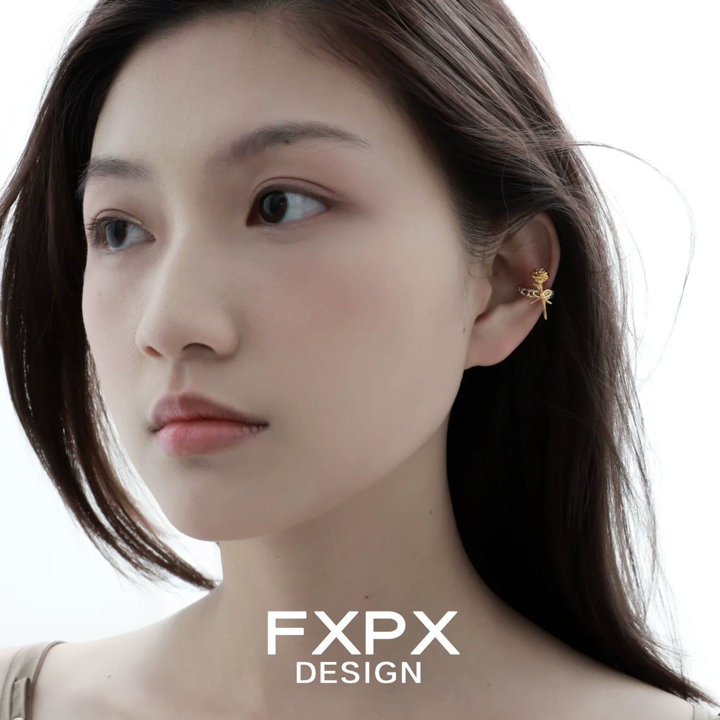 Y2K golden rose ear cuff on model showcasing its elegant design and unique style