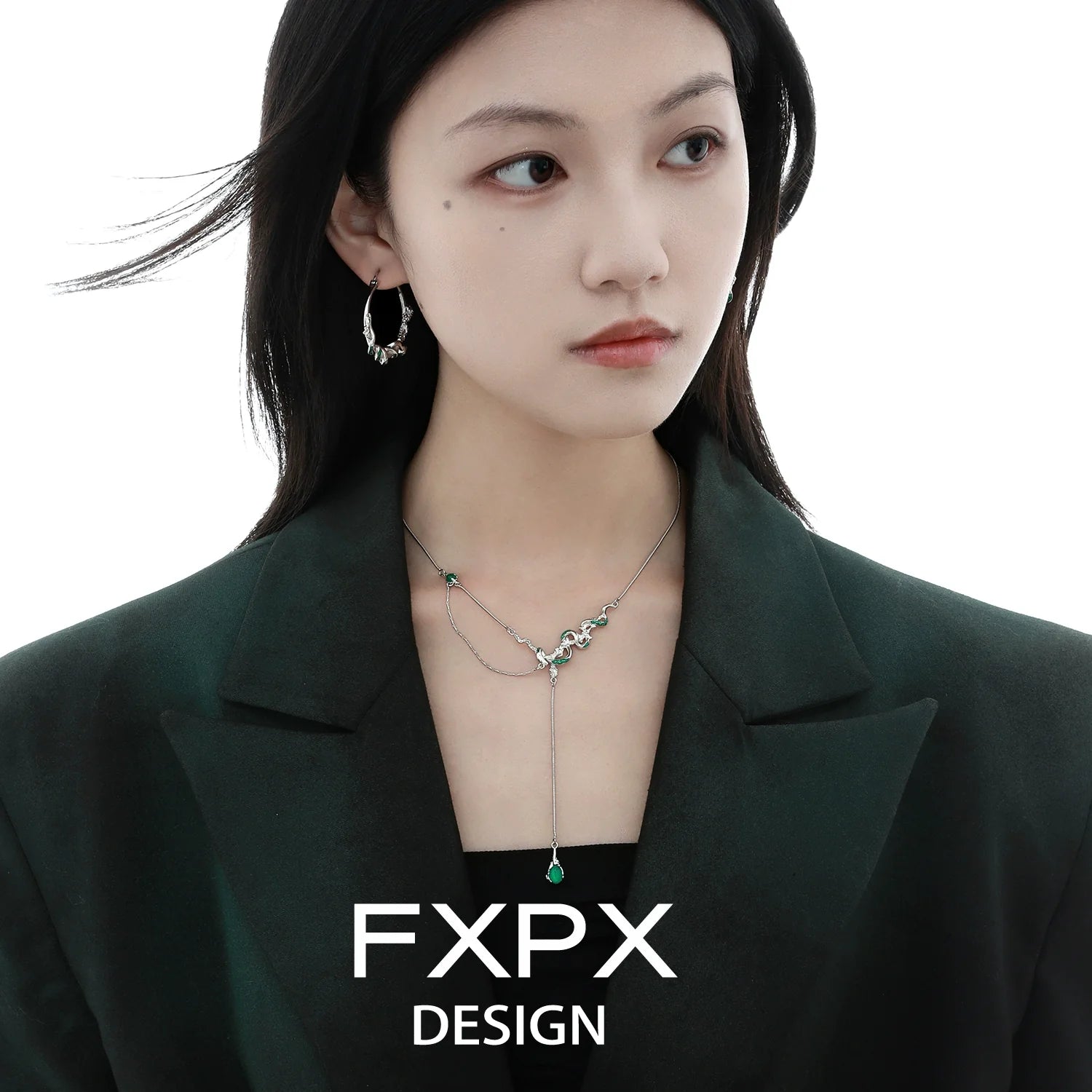 FXPX Y2K ouroboros earrings showcased on a model wearing a stylish outfit
