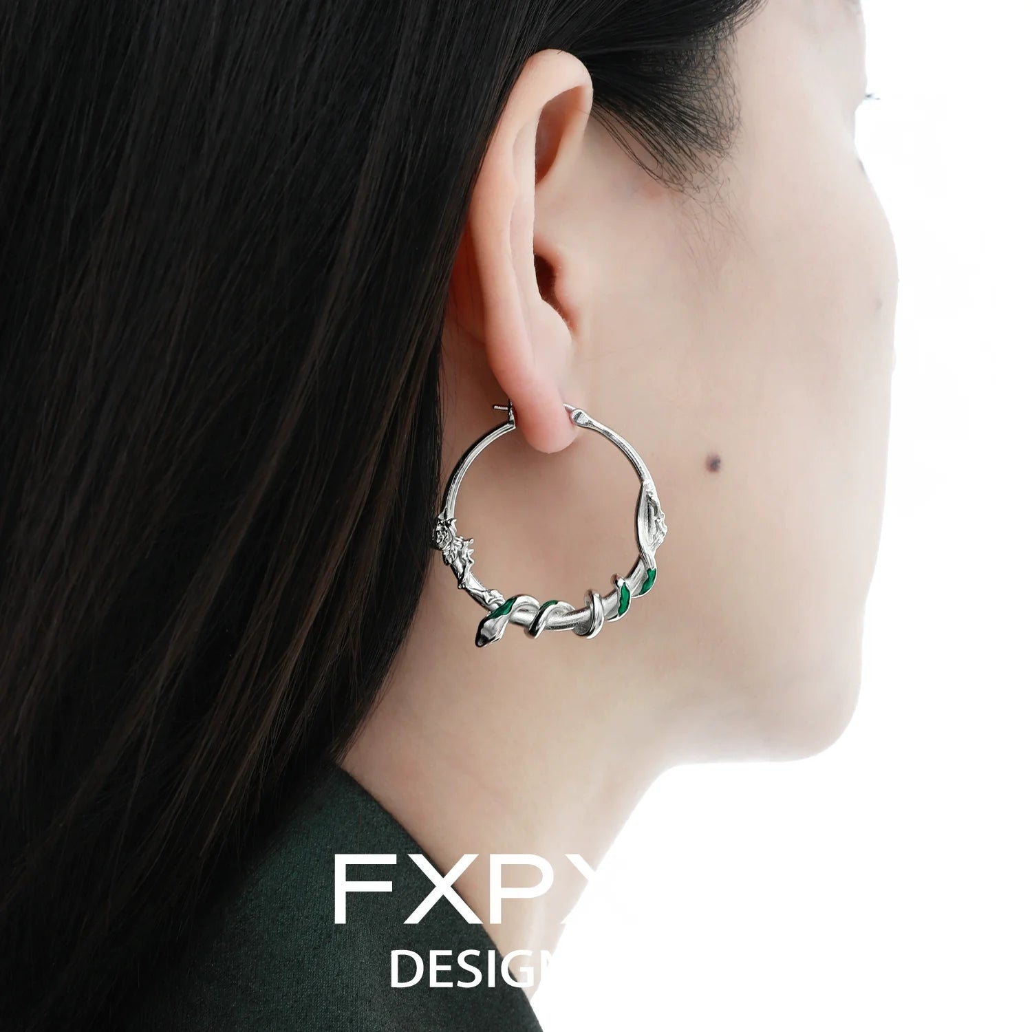 Y2K ouroboros earrings in silver with intricate design, perfect for trendy fashion lovers