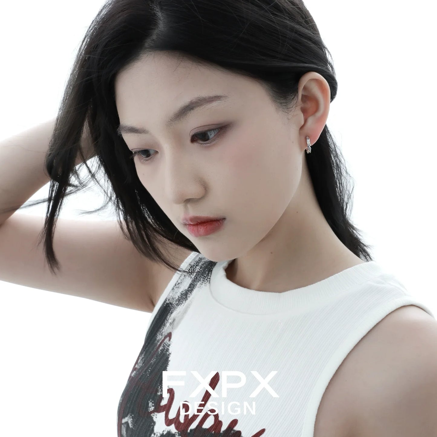 Model wearing FXPX Y2K prism glow earrings, showcasing a stylish and modern design