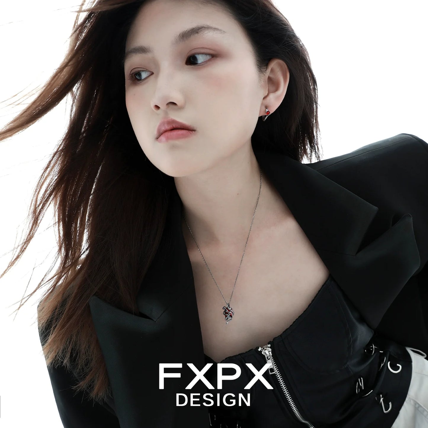 Model wearing an FXPX Y2K rose snake necklace in silver, complementing a stylish outfit.