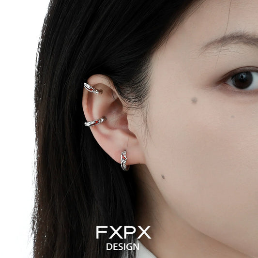 Y2K scarlet veil stud earrings showcased on a model's ear for a trendy jewelry look