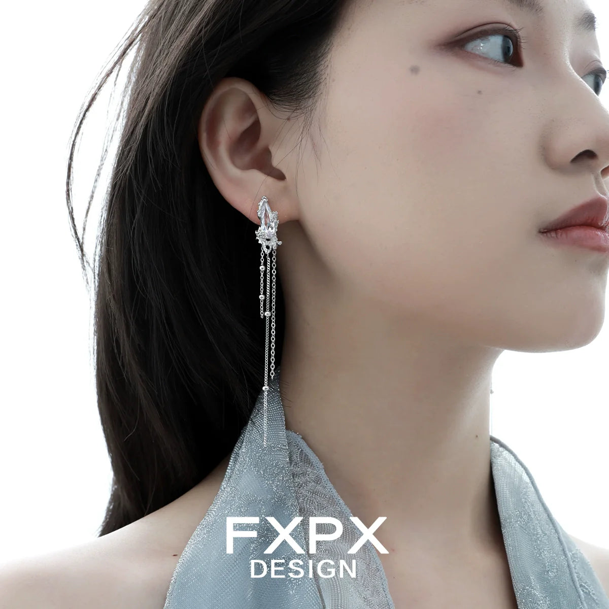 Y2K silver tassel earrings featuring a delicate design and stylish shimmer for modern fashionistas