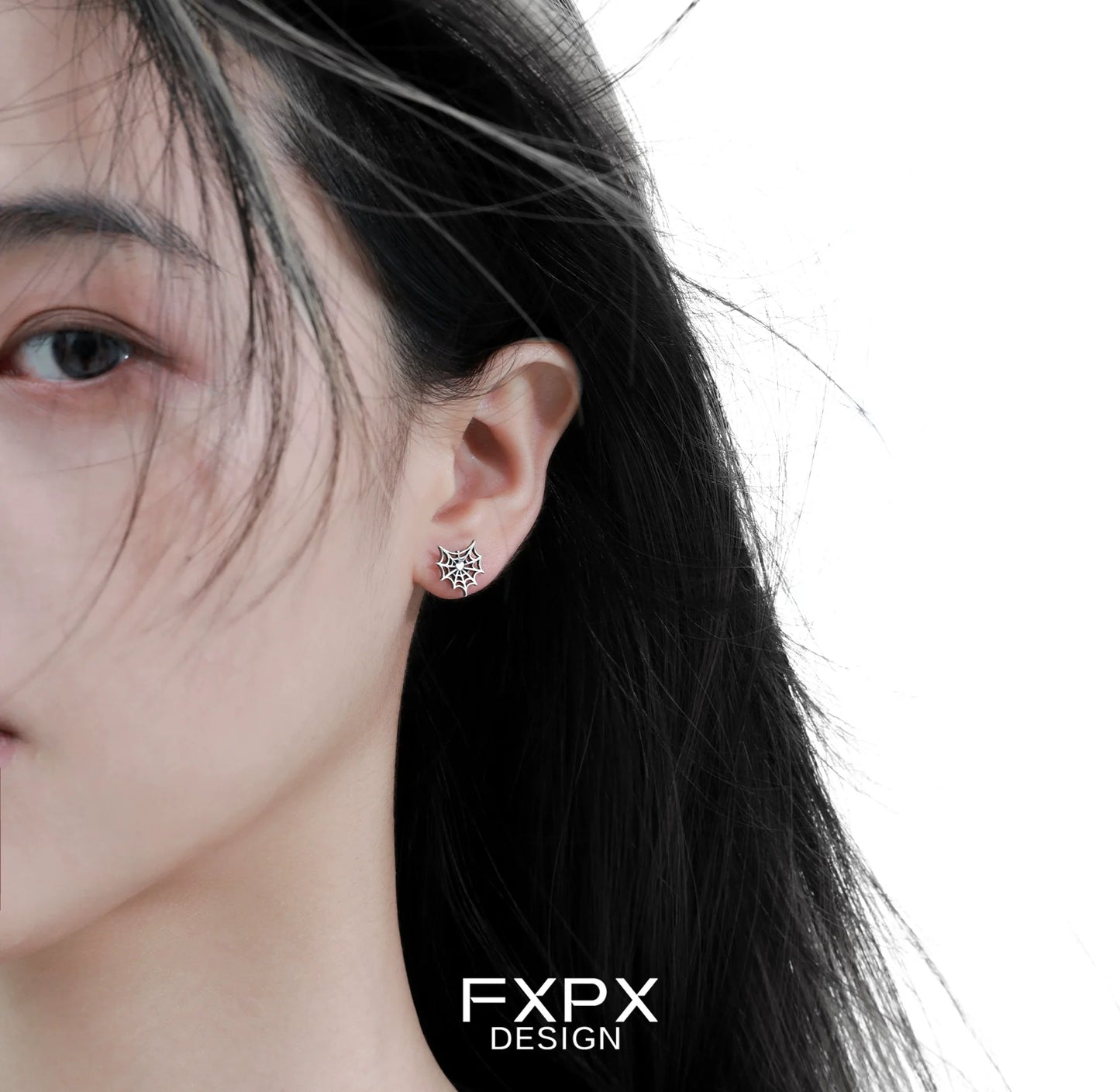 FXPX Y2K spider web earrings showcased on a model with sleek hair for a stylish look